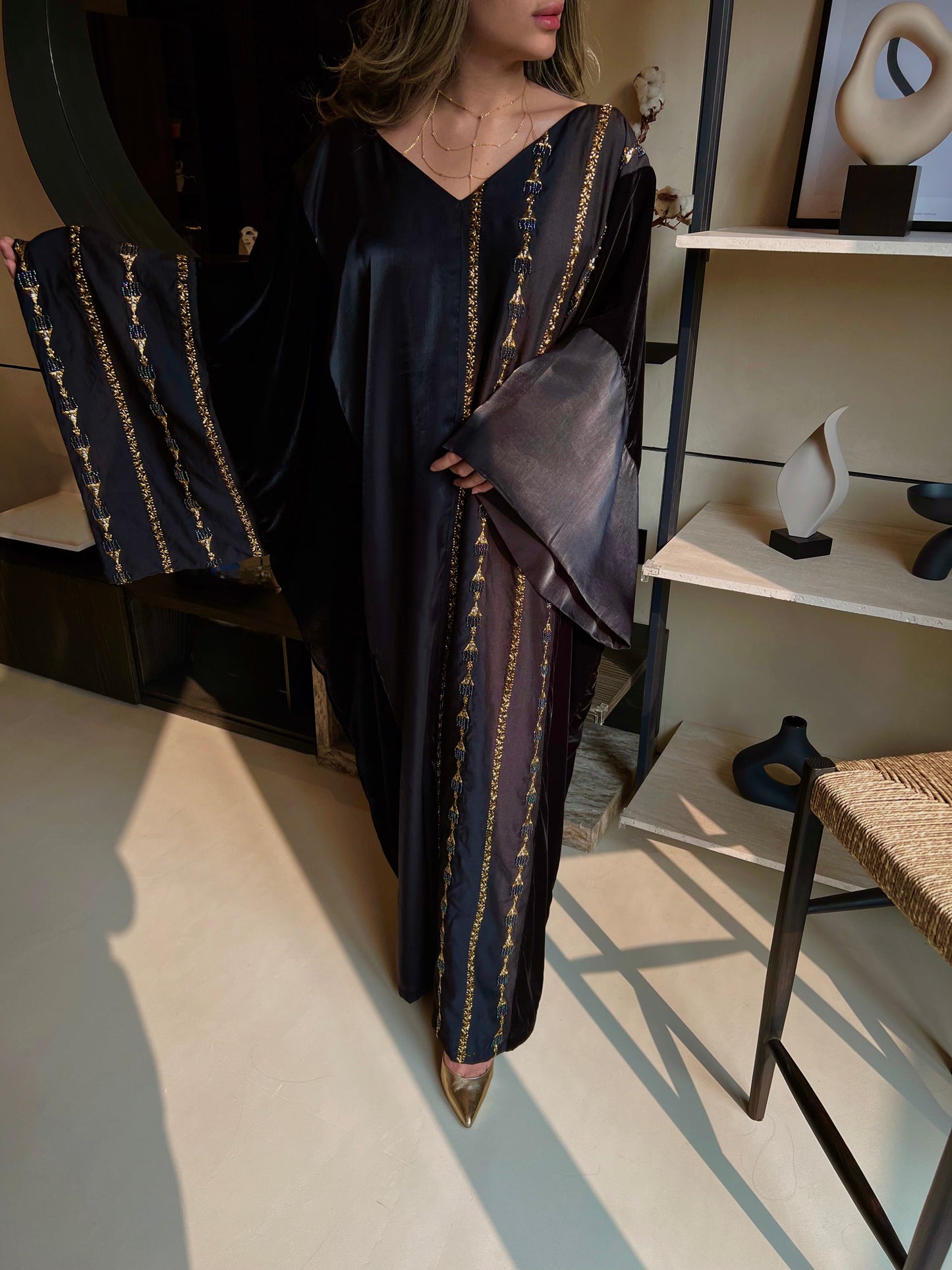 Striped black kaftan with gold embroidery